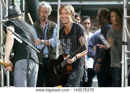 NEW YORK-AUG 12: Keith Urban performs in concert on ABC's 