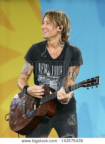 NEW YORK-AUG 12: Keith Urban performs in concert on ABC's 
