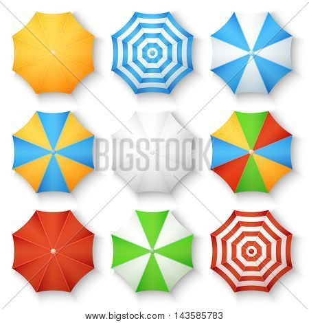 Beach sun umbrellas top view vector icons. Set of parasol with colored striped pattern illustration