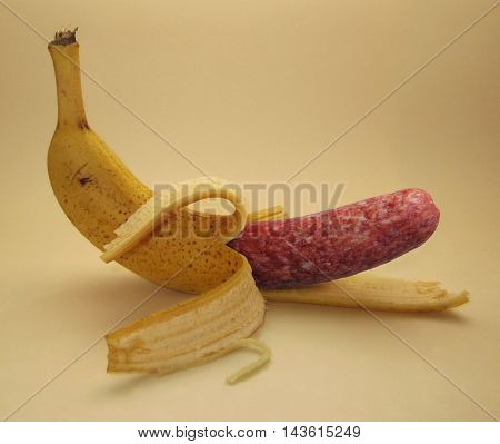 A sausage is inside of a banana.