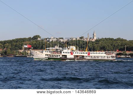 ISTANBUL TURKEY - JULY 25 2016: Sehir Hatlari ferry carry passengers between Asian side to European side of Istanbul. Sehir Hatlari was established in 1844 and now carry 150000 passengers a day.