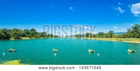 Rowing path on beautiful Jarun lake in Zagreb, Croatia, sunny summer day
