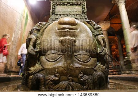 ISTANBUL TURKEY - JULY 28 2016: Medusa columns base inside Basilica Cistern. The Basilica Cistern is the largest of several hundred ancient cisterns that lie beneath the city of Istanbul.