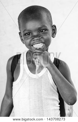 KARA, TOGO - MAR 9, 2013: Unidentified Togolese boy portrait. Children in Togo suffer of poverty due to the unstable econimic situation