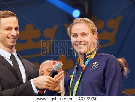 STOCKHOLM SWEDEN - AUG 21 2016: Swedish soccer player Lisa Dahlkvist winning olympic silver smiling when the swedish olympic athletes are celebrated in Kungstradgarden Stockholm Sweden August 212016