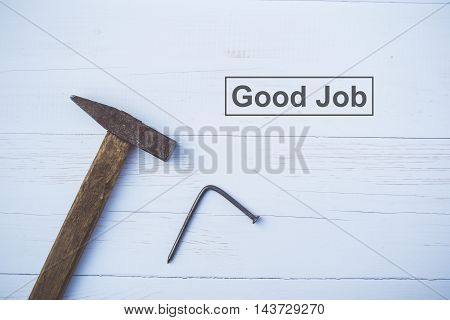 Set of old and rusty hammers on blue background