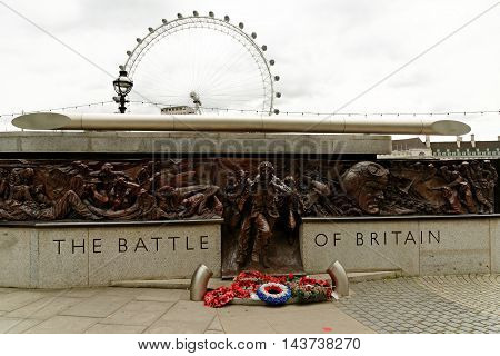 LONDON UK - JULY 8 2016: The Battle of Britain Memorial on the Victoria Embankment a 25m-long bronze monument commemorating the pilots who died during WWII's Battle of Britain.