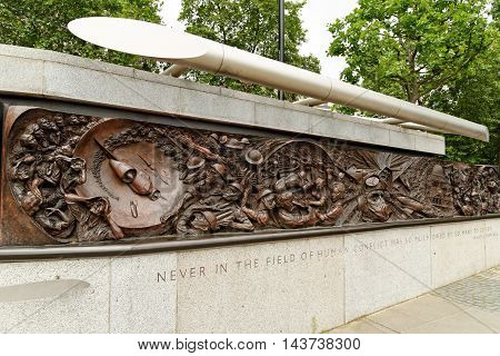 LONDON UK - JULY 8 2016: The Battle of Britain Memorial on the Victoria Embankment a 25m-long bronze monument commemorating the pilots who died during WWII's Battle of Britain.