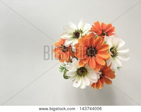 Handmade flowers from fabric on a white background .