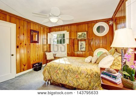 Craftsman Bedroom Interior With Wooden Pannel Walls.