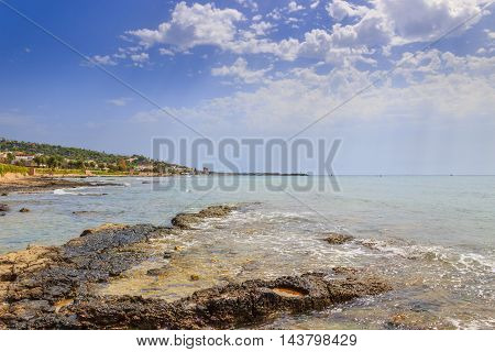 Salento coast, Ionian sea:panoramic view of Torre Vado town.Italy (Apulia).In the background the beach and the tourist port with the watchtower.