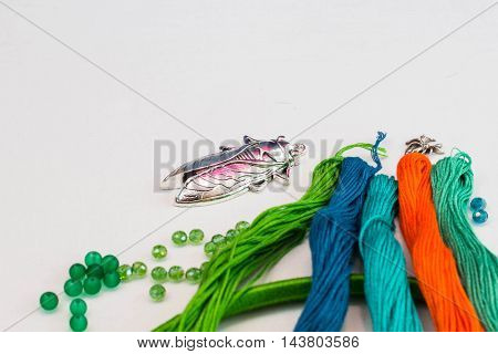 set for making a Dreamcatcher beads thread on a white background