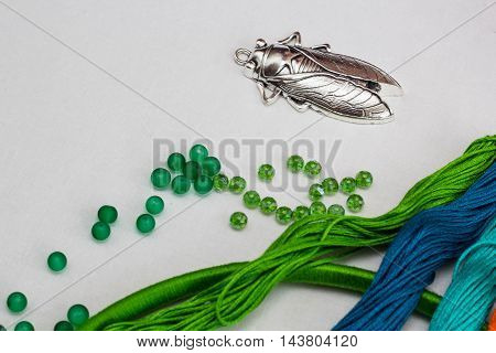 set for making a Dreamcatcher beads thread on a white background