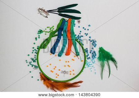 set for making a Dreamcatcher beads thread on a white background