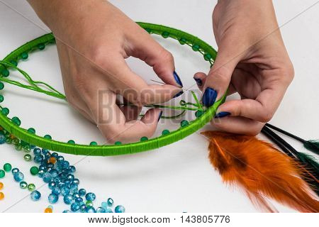 set for making a Dreamcatcher beads thread on a white background
