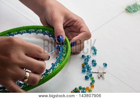 set for making a Dreamcatcher beads thread on a white background