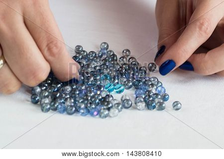 set for making a Dreamcatcher beads thread on a white background