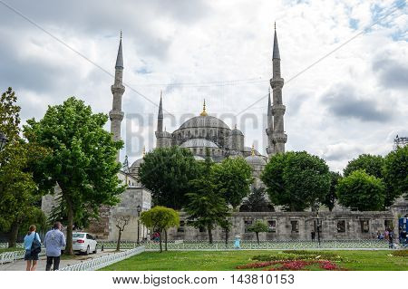 ISTANBUL TURKEY - JUNE 19 2015: Sultan Ahmet Mosque (Turkish: Sultan Ahmet Camii) is a historic mosque in Istanbul Turkey. The mosque is popularly known as the Blue Mosque for the blue tiles adorning the walls of its interior
