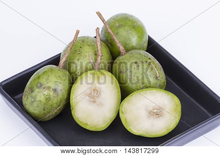 Fresh Hog Plum (wild Mango) On Black Dish