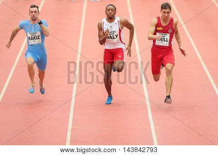 LINZ, AUSTRIA - FEBRUARY 6, 2015: Kiran Daly (#237 Great Britain) competes in the men's 60m event in an indoor track and field event.