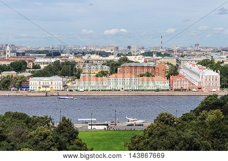 Top view of the Neva river and the University Embankment with Peter II Palace in St. Petersburg