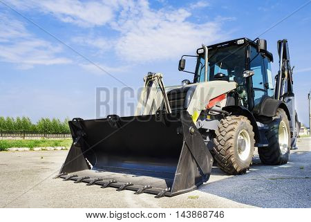 The New Tractor Is On The Road In The City