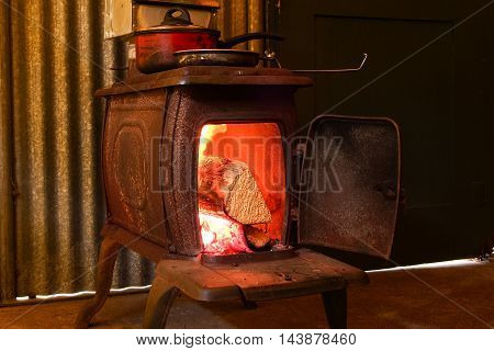 a burning fire in an old-fashioned stove