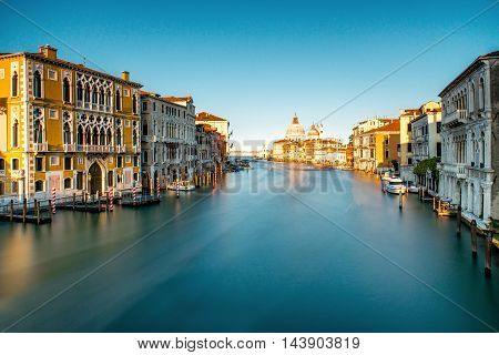 View on Grand canal with Santa Maria basilica from Accademic bridge in Venice. Long exposure image technic