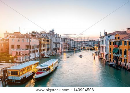 View on illuminated Grand canal with from Accademic bridge at the dusk in Venice.