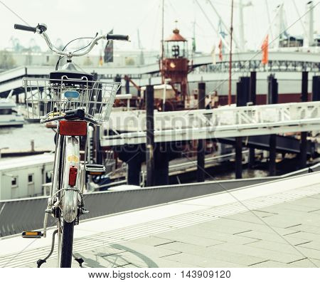 post card city view from vintage bicycle, riverside Germany, Hamburg close ap