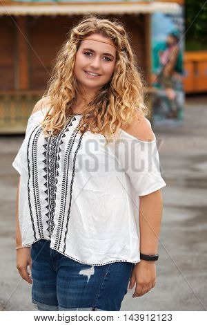 Shot of a beautiful blond plus-size model in summer clothes