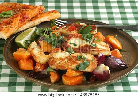 grilled haloumi cheese wit roast onion and sweet potato