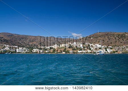 The fishing village of Elounda and its surroundings. View from the Gulf of Mirabello. Crete