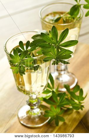 Woodruff Punch with Woodruff Herbs on bright background