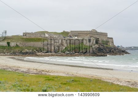 coastal scenery including a fortification near a commune named Quiberon in the Morbihan department in Brittany France