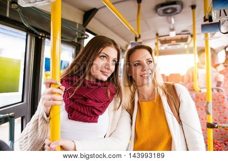Beautiful Young Women Traveling By Bus, Having Fun