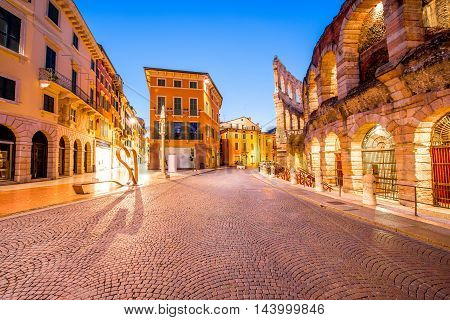 Night view on illuminated Bra square with Arena in Verona city