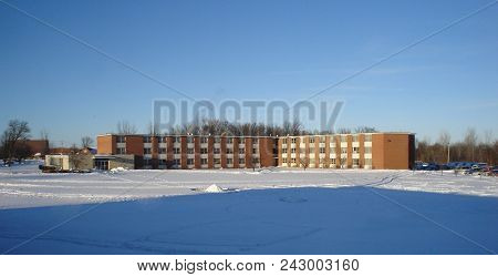 Whitney Hall In Winter Surrounded By Snow Under A Clear Blue Sky, Defiance College, Defiance, Oh, Ja