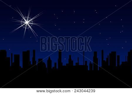A Verry Bright Christmas Star In The Night Sky Set Over A City Silhouette