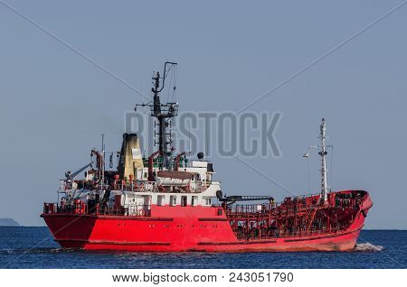 Oil Products Tanker - A Small Red Ship On The Sea