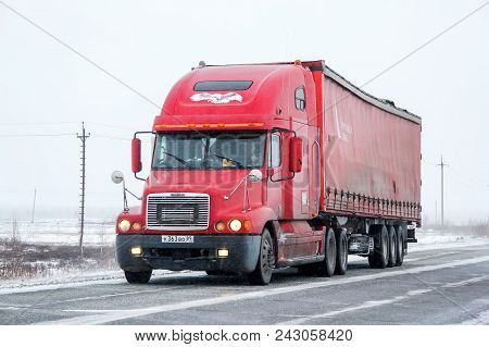 Novyy Urengoy, Russia - October 12, 2013: Semi-trailer Truck Freightiner Century Class At The Interu