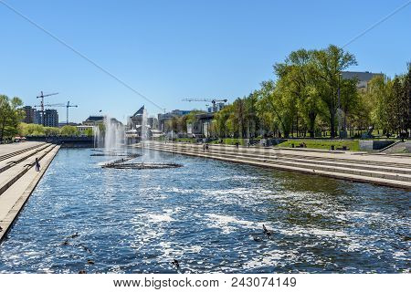Yekaterinburg, Russia - May 23, 2018: Fountain In Historical Square On Iset River In Center Of City