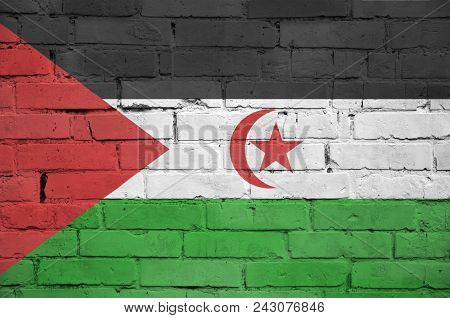 Western Sahara Flag Is Painted Onto An Old Brick Wall