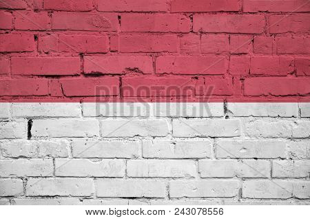 Indonesia Flag Is Painted Onto An Old Brick Wall