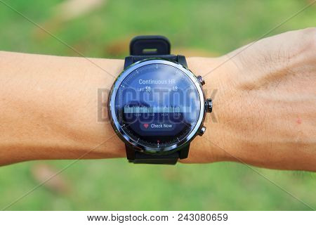 Bangkok , Thailand  - 24 May, 2018 :checking The Heart Rate By Amazfit Stratos Smart Watch In The Pu