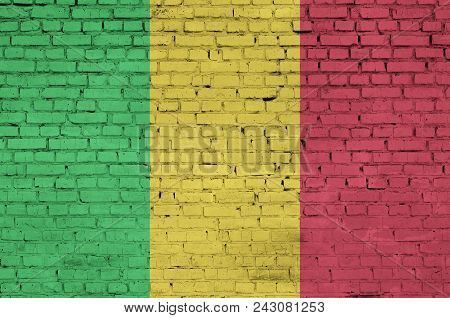 Mali Flag Is Painted Onto An Old Brick Wall