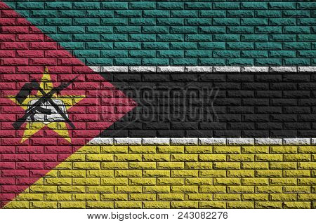 Mozambique Flag Is Painted Onto An Old Brick Wall