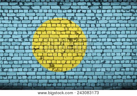 Palau Flag Is Painted Onto An Old Brick Wall