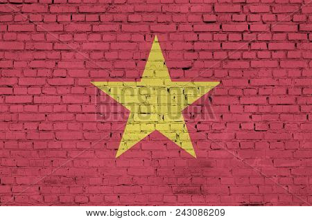 Vietnam Flag Is Painted Onto An Old Brick Wall