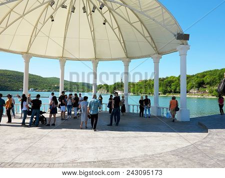 Abrau-durso - May 5, 2018: People Rest At The Mountain Lake Abrau. Abrau-durso, Krasnodar Region, Ru